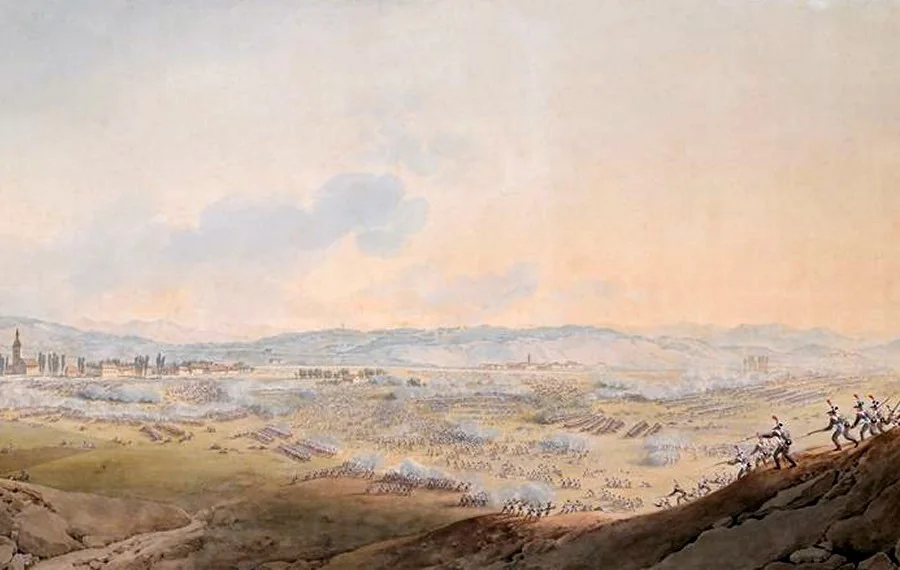 Watercolour: a bird's-eye view of a vast plain where long lines of troops clash in the smoke, a village and its church tower on the left, hills on the horizon and, in the right foreground, infantrymen climbing a slope