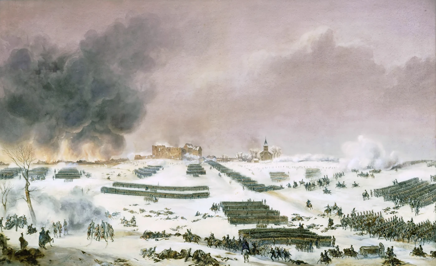 Panoramic view of the snow-covered battlefield: long lines of infantry and gun smoke in front of a village dominated by a church tower