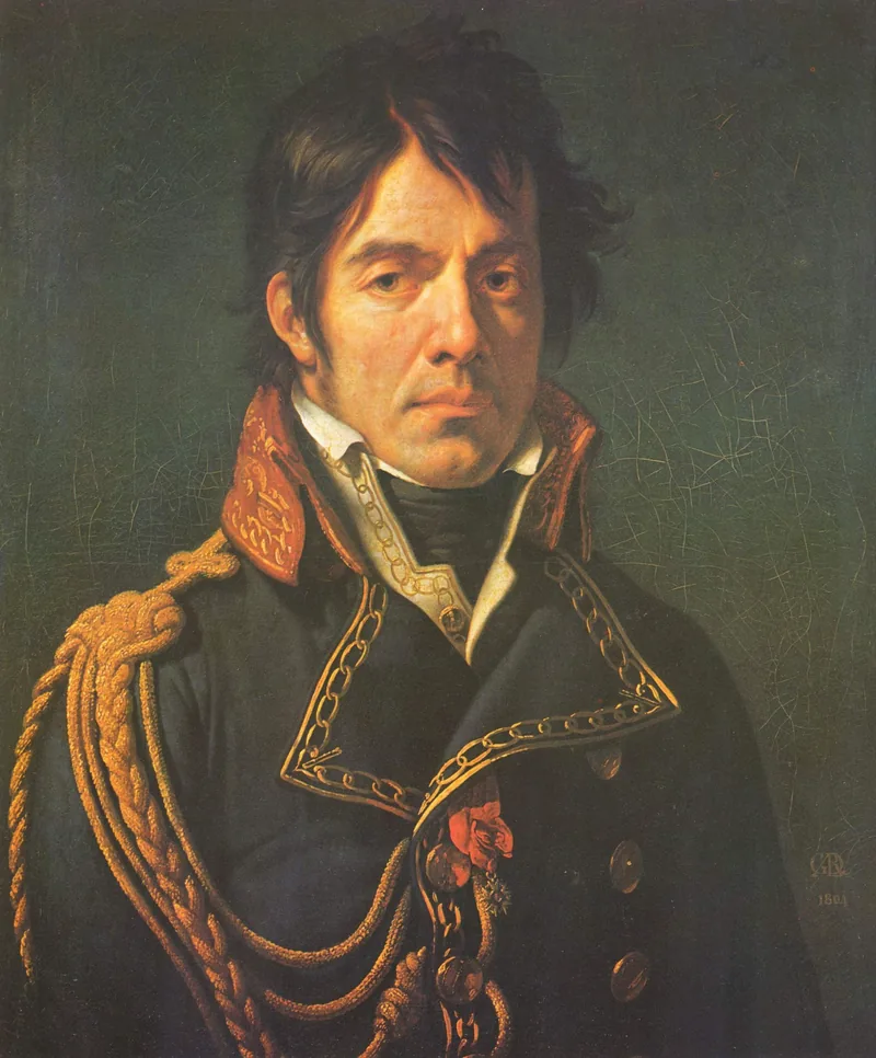 Portrait en buste d'un homme aux cheveux bruns mi-longs, au regard grave, en habit bleu foncé à haut col brodé d'or, portant la croix de la Légion d'honneur