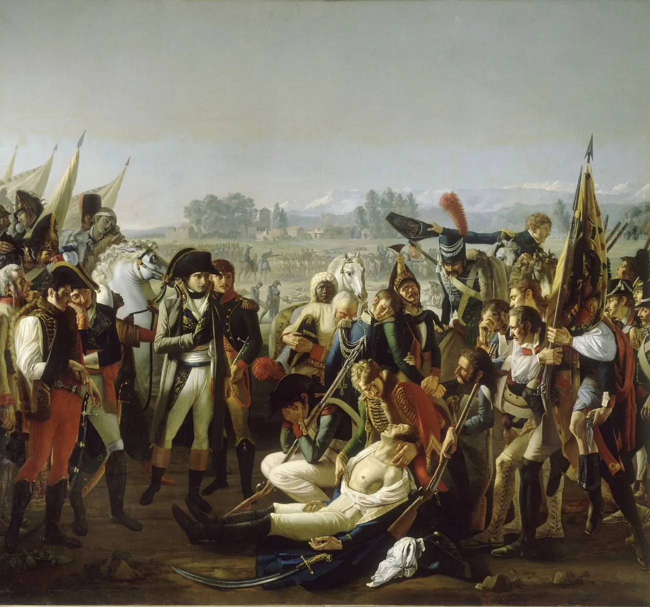 Painting: officers and soldiers gather around the body of Desaix, lying bare-chested on the battlefield, flags and bayonets raised around them