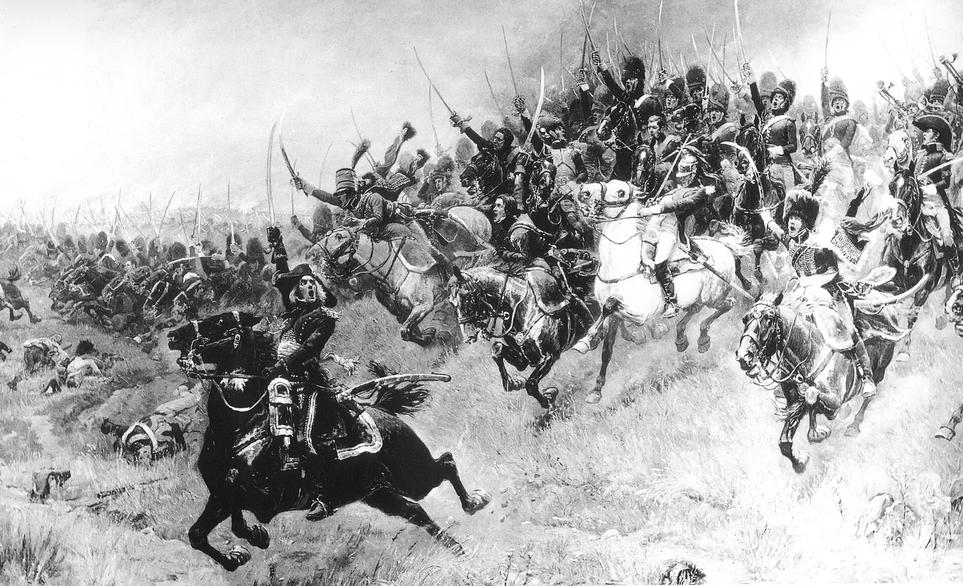 Black-and-white illustration: mounted grenadiers in bearskin caps charge with drawn sabres against enemy horsemen