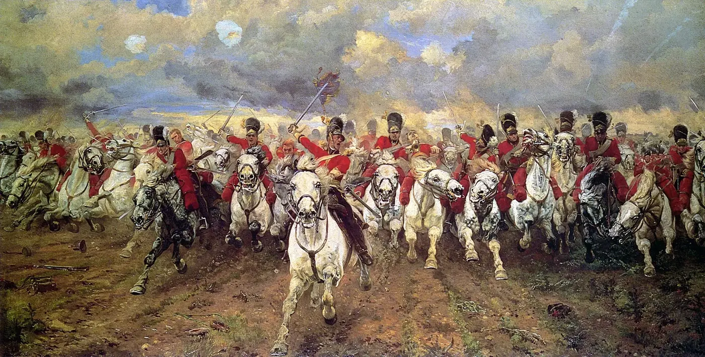 Charge frontale des dragons écossais Scots Greys sur leurs chevaux gris, lancés au galop vers le spectateur